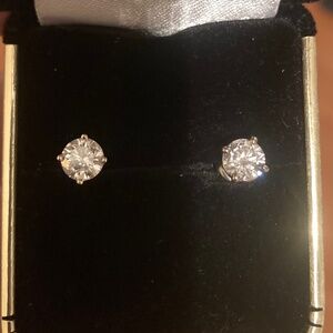 DIAMOND stud earrings.